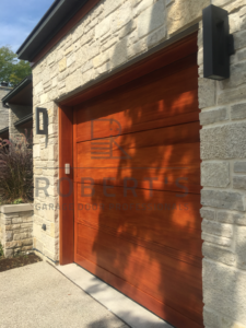 Garage Doors With Custom Wood Veneers And Frames Completed